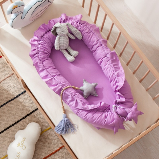 reducteur de lit cocon violet