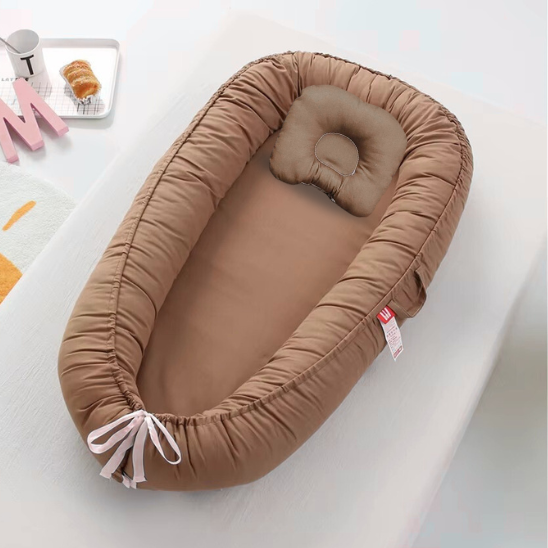 nid bebe reducteur de lit