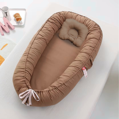 nid bebe reducteur de lit