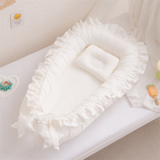 reducteur de lit bebe blanc