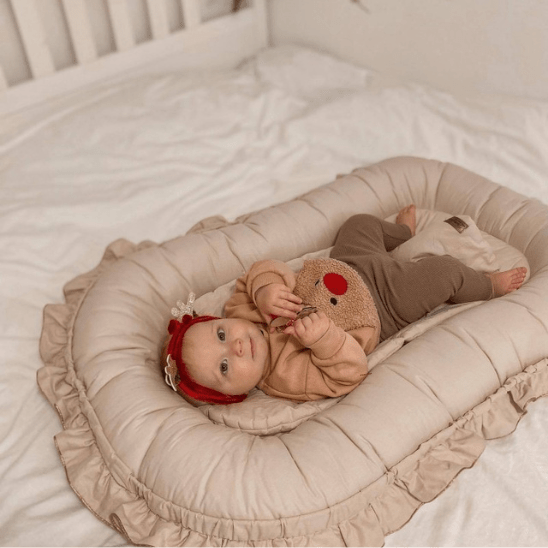 reducteur de lit bebe cocon securisant 