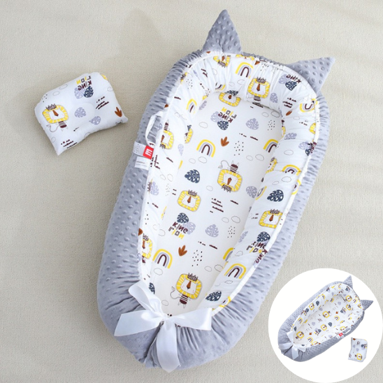 reducteur de lit bebe forme chat gris lion