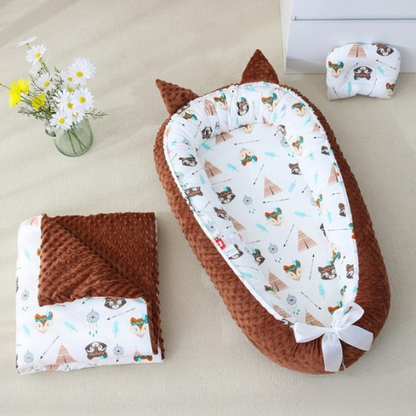 reducteur de lit bebe marron confortable