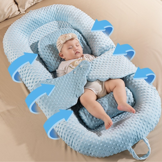 reducteur de lit bleu confort bebe endormi