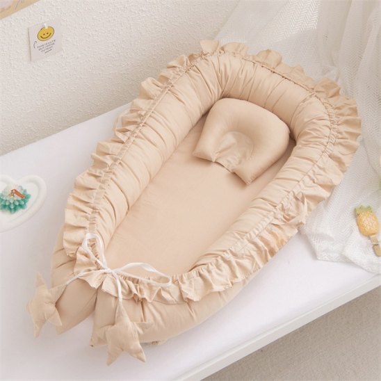 reducteur de lit kaki nid pour voyage