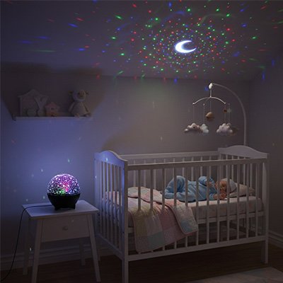 veilleuse projection bambin endormi dans son lit